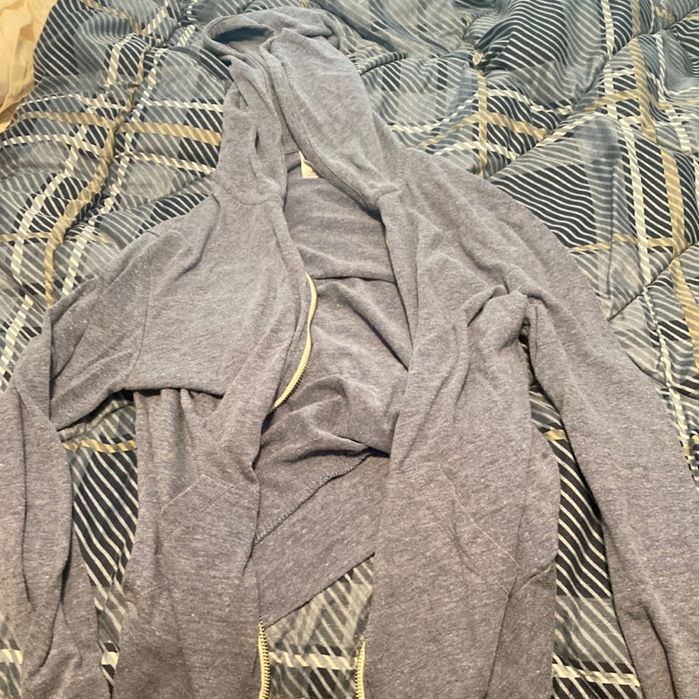 Light blue zip up hoodie by alternative. Size M